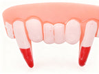 DIENTES SANGRIENTOS FALSOS 1PC