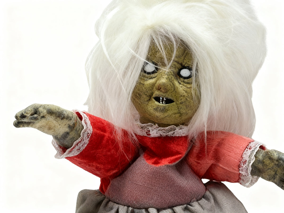 Muñeca Sentada Luminosa con Sonido Cabello Blanco