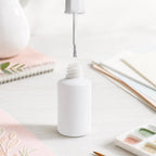Concealer pen with individual brush