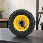 Inflatable wheel with ball bearings and metal spokes